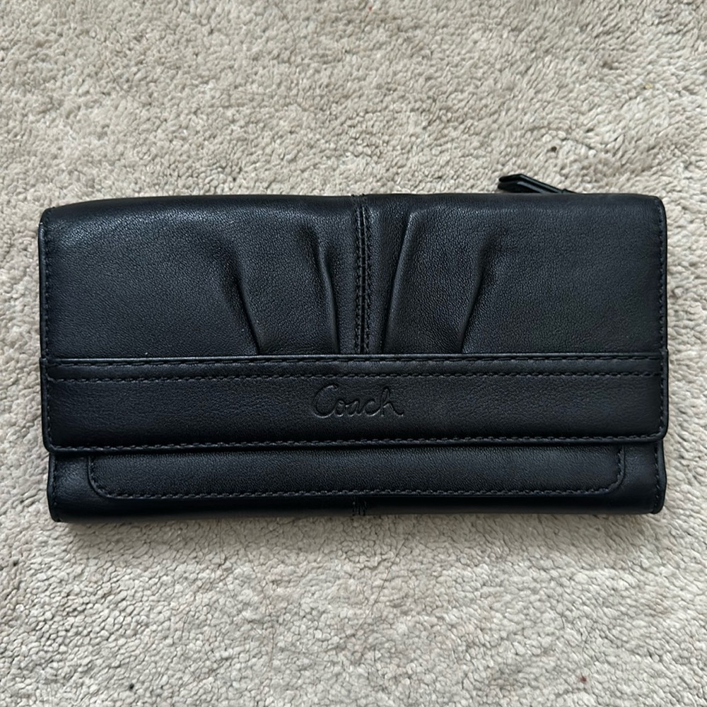 Black leather coach wallet. Excellent condition